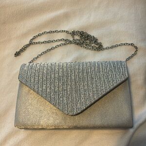 Silver satin and rhinestone clutch never used